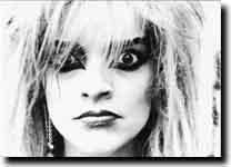 Nina Hagen, Berlin-Tempodrom, 1987,( with 1 eye she stares into the camera and same time she rolls the other eye to the music...)(genius.)